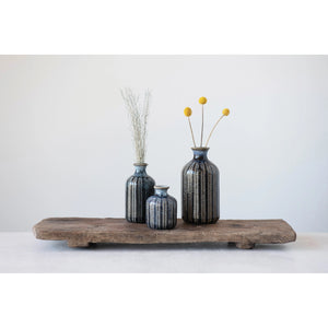 Small, Medium, and Large embossed glazed stoneware vases in deep blue color