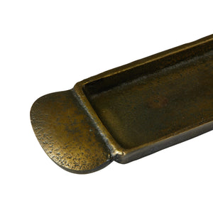 Magnified side view of cast aluminum antique brass tray handle detail. 