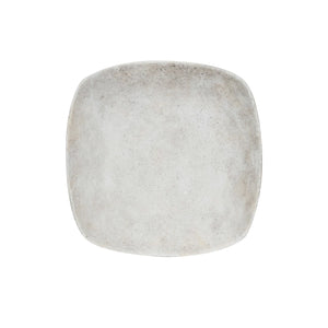 Top down view of rounded square stone tray.