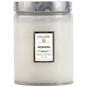18 ounce Mokara Orchid Voluspa candle. 