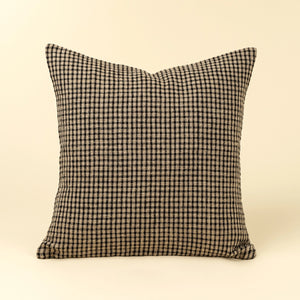 Twenty inch square feather down decorative pillow in a classic black and cream windowpane stripe pattern. 
