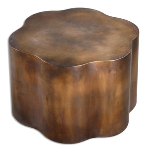 Copper side table with a waved pattern