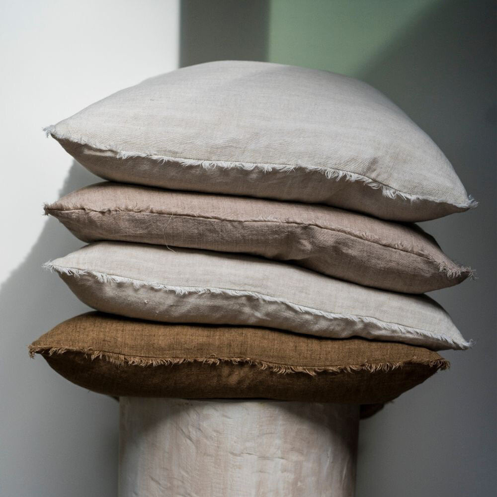 Compilation of neutral linen oversized down pillows. Indaba Trading. Artisan hand made. 