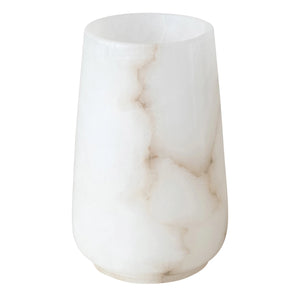 Alabaster marble white hurricane candle votive on a white background. 