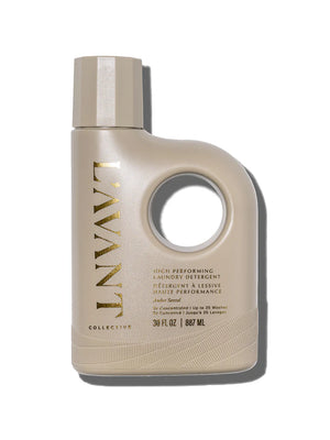 Beige laundry detergent bottle with gold text on a white background. LAVANT. Ambre Santal.