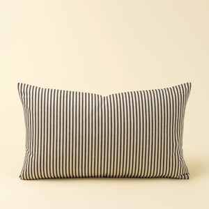 Striped 21" x 12" lumbar pillow with black and white lines on a beige background.