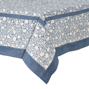 Floral patterned tablecloth with blue border on a white background. Meadow Bleu tablecloth. Couleur Nature. 