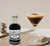 Bottled Coffee syrup on tray next to espresso martini. Simple Goodness Sisters. Pacific Northwest farms. #Farmtotable 