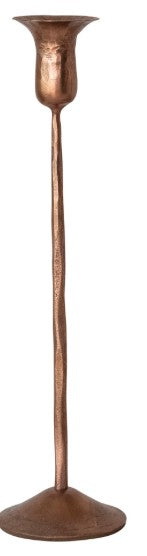 Medium sized antique copper candle taper holder displayed against a white background. 