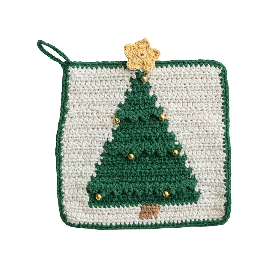 Crocheted retro cotton pot holder with a Christmas tree design against a white background. 