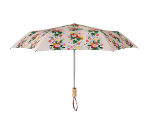 Dahlia patterned umbrella opened on a white background. Rifle Paper Co. 