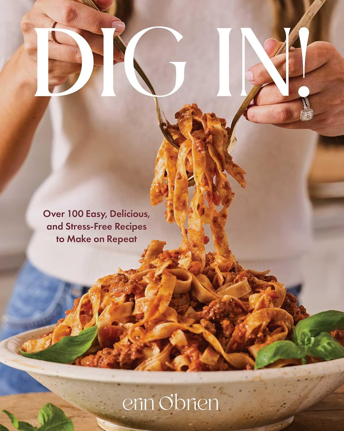 Book cover of 'Dig In!' with hands holding pasta, featuring a bowl of pasta and the title text.
