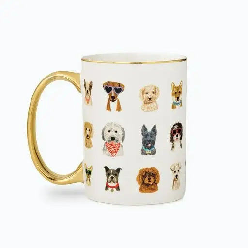 White mug with gold handle featuring illustrations of various dog breeds on a white background. Rifle Paper Co. 