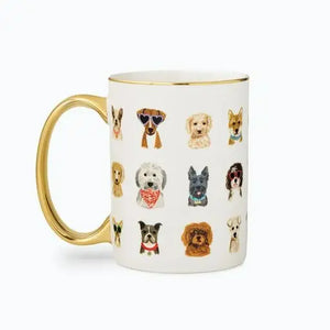 White mug with gold handle featuring illustrations of various dog breeds on a white background. Rifle Paper Co. 