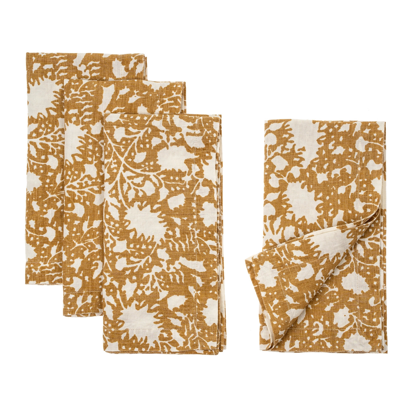 Set of four floral-patterned yellow ochre linen napkins with a white background.