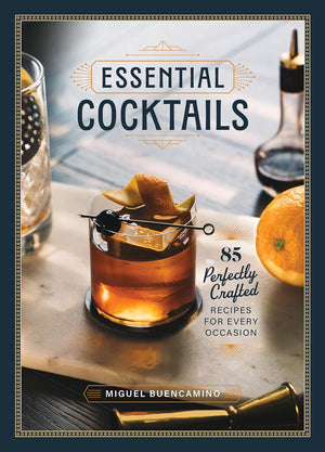 Book cover of 'Essential Cocktails' with a cocktail and ingredients on a table. Miguel Buencamino.