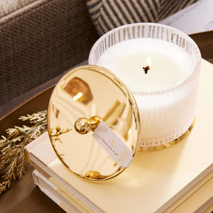 Gilded frosted wood grain Frasier Fir candle. White glass jar with gold metal lid. Thymes. Holiday candle. 