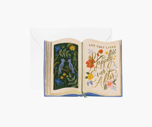 Decorative book with woodland and bird illustrations and " Happily Ever After" text on a white background.