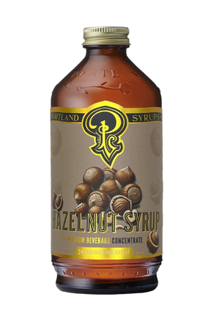 Bottle of Hazelnut syrup beverage concentrate. Portland Syrups. 
