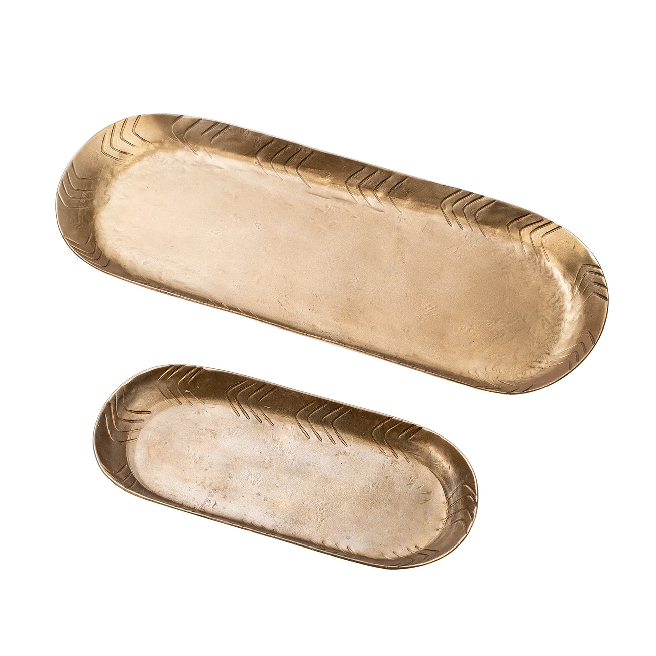 Two gold oval iron trays with chevron pattern edge on a white background. Medium and small size. 
