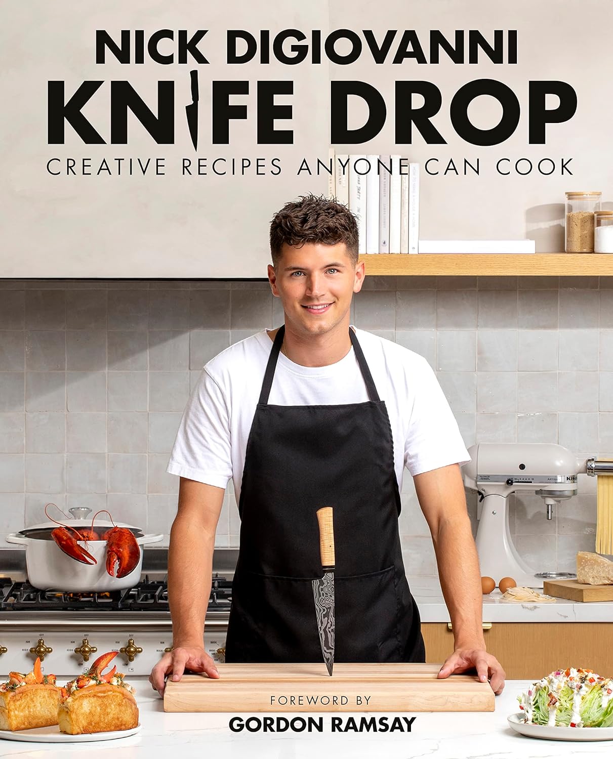 Front cover of "Knife Drop" by Nick Digiovanni. MasterChef  kitchen. Creative recipes that anyone can cook with tips and tricks on how to have a prepped kitchen and some of the helpful things needed to successfully follow recipes. 