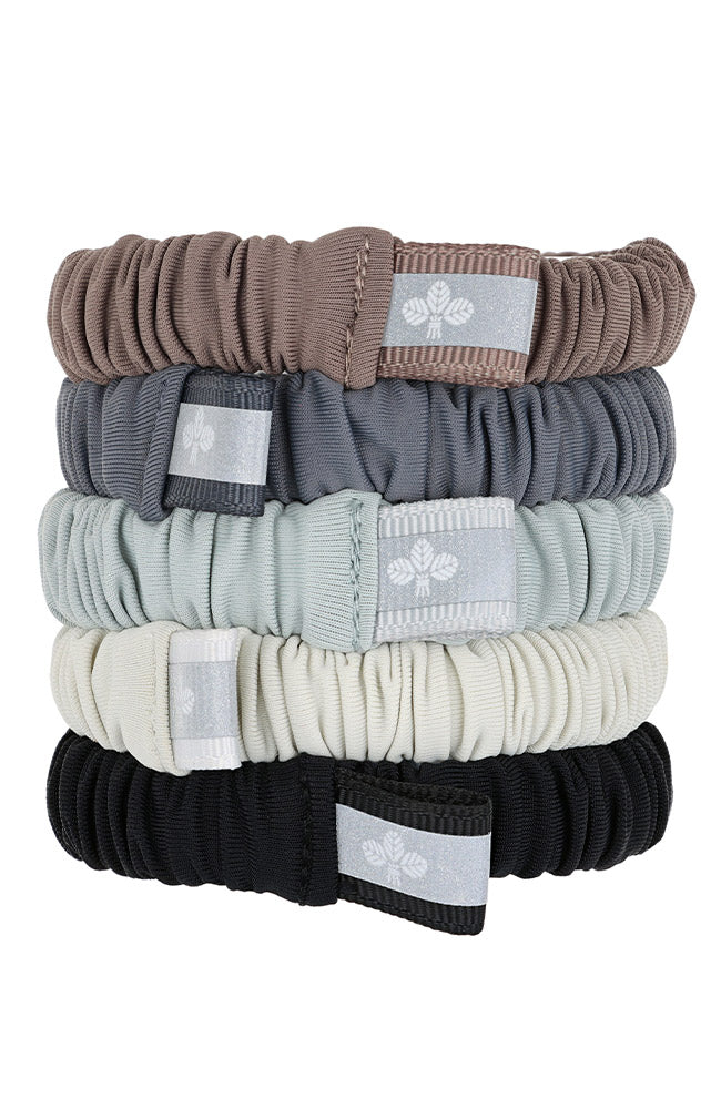 set of five fabric covered hair ties in neutral colors