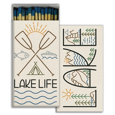 Decorative matchbox with 'Lake Life' design featuring oars, fish, and other lake-themed illustrations.