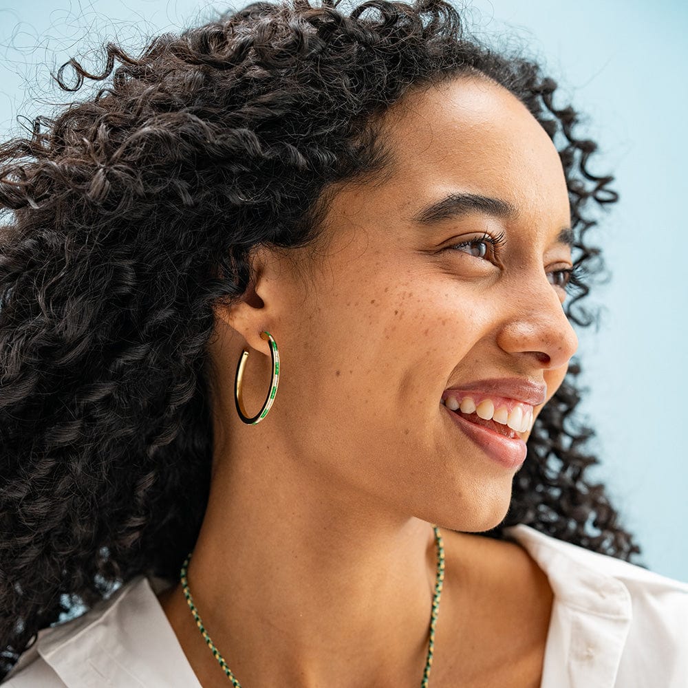 Kelly green beaded brass hoop earring. Ink & Alloy. 