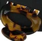 A close-up of a tortoiseshell mini hair claw clip on a black background.