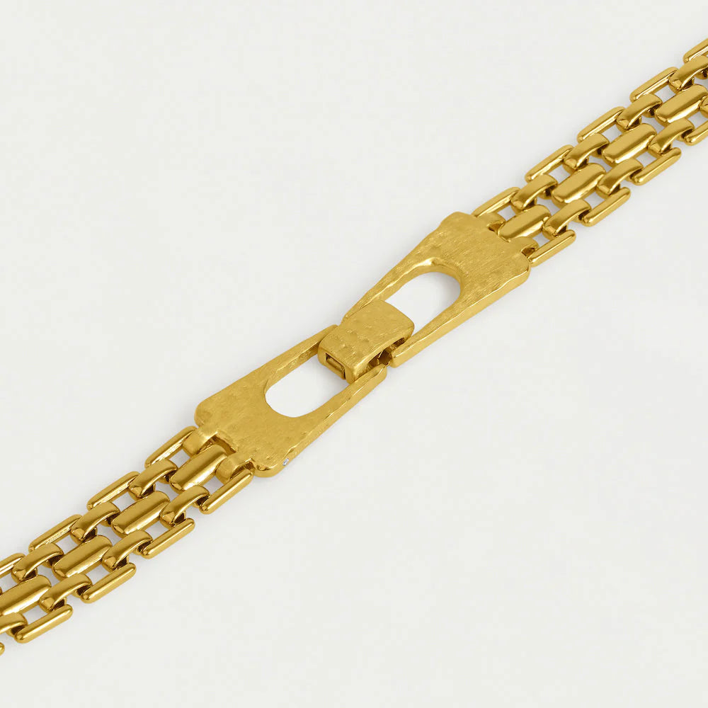 Chunky gold chain link clasp bracelet on a white background. Dean Davidson jewelry. 