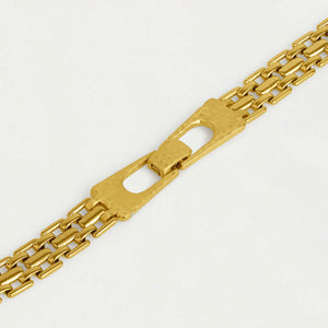 Chunky gold chain link clasp bracelet on a white background. Dean Davidson jewelry. 