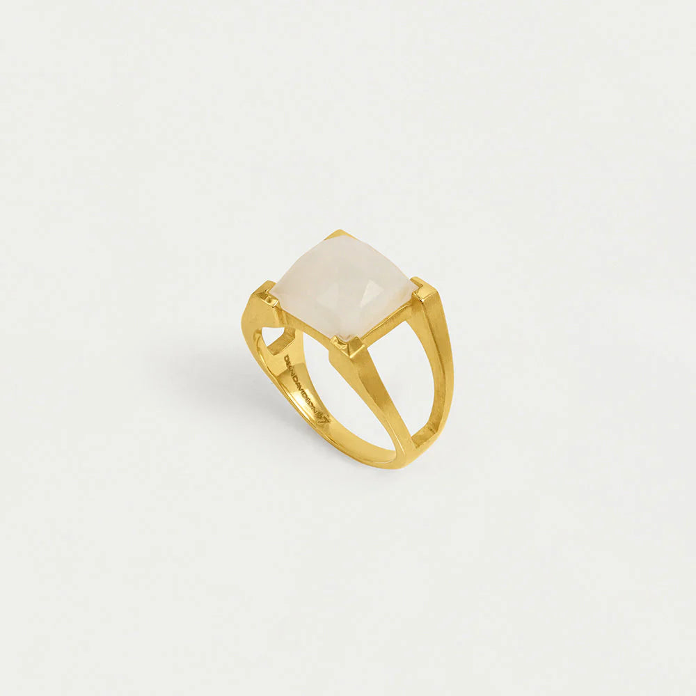 Gold ring with a white Moonstone center stone on a light gray background. Dean Davidson jewelry.
