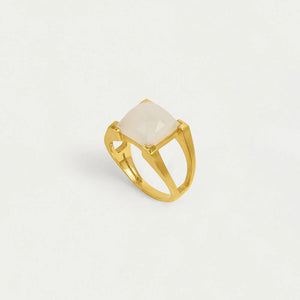 Gold ring with a white Moonstone center stone on a light gray background. Dean Davidson jewelry.