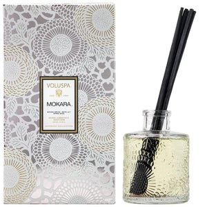 Voluspa Mokara diffuser with packaging on a white background. 