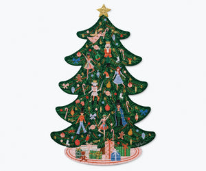 Holiday jigsaw puzzle with nutcrackers and ballerinas in the shape of a christmas tree. Rifle Paper Co. 