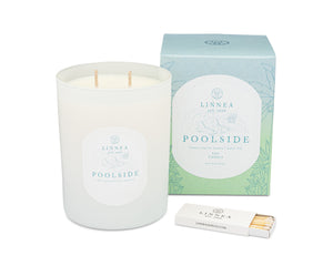 Linnea 'Poolside' candle with packaging and matches on a white background