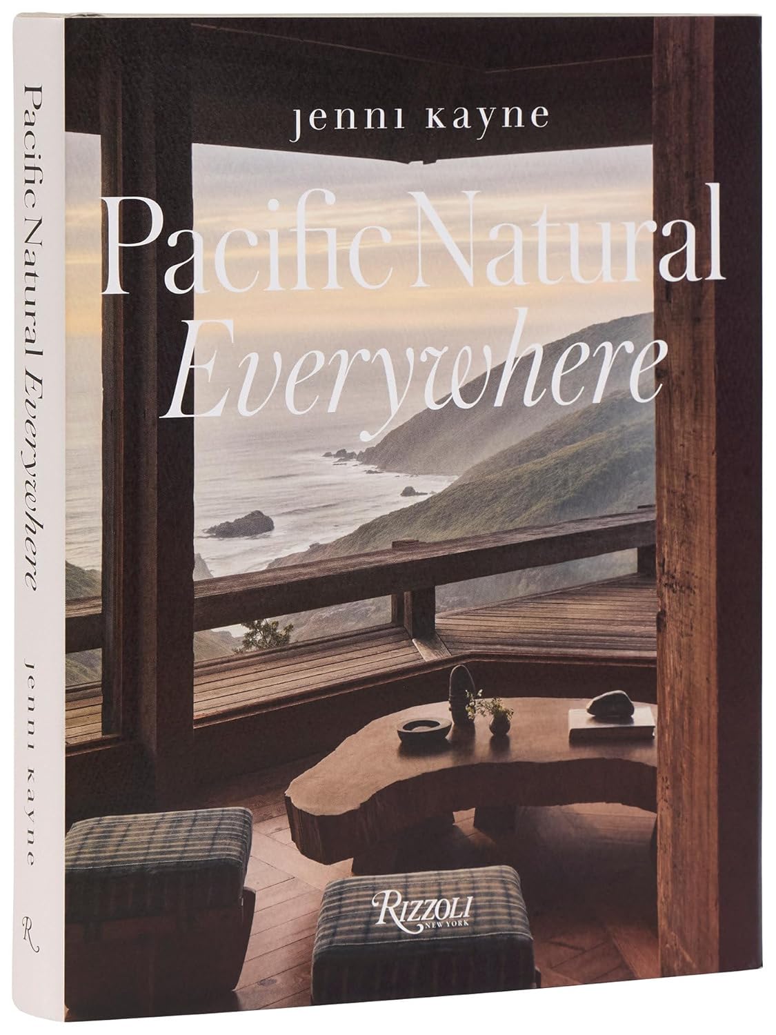 Book cover of 'Pacific Natural Everywhere' by Jenni Kayne with a serene coastal scenic view and Rizzoli publishing logo.