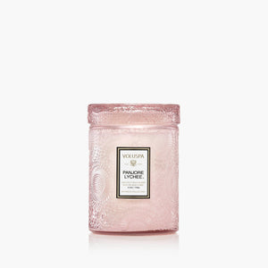 5.5 ounce Voluspa glass jar candle in scent Panjore Lychee. 