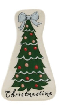 An off-white ceramic Christmas ornament shaped like an angel, featuring a green Christmas tree with red and pink ornaments, a white bow, and the word 'Christmastime' written in black script at the bottom.