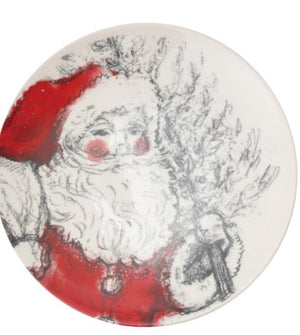 A round white plate featuring a stylized, sketch-like illustration of Santa Claus with a red hat and red coat, holding a christmas tree.