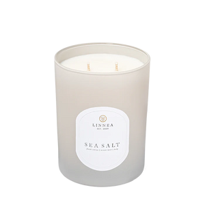 Frosted candle with a white label on a white background