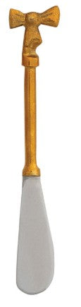 Silver and gold stainless steel charcuterie spreader with bow on top. 