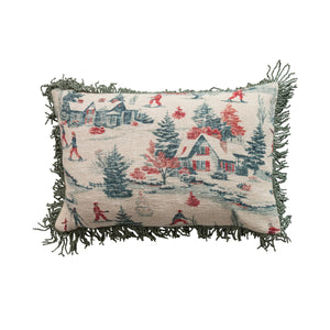 Decorative pillow with winter ski scene and boullion fringe design against a white background