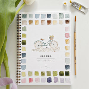Spring watercolor workbook with a bicycle illustration and watercolor swatches on a white background. Emily Lex Studios. 
