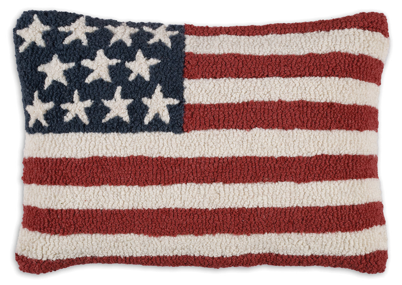 Pillow with American flag, stars, and stripes design on a white background