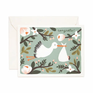 Greeting card with stork and baby illustration and 'congrats!' text on a floral background.