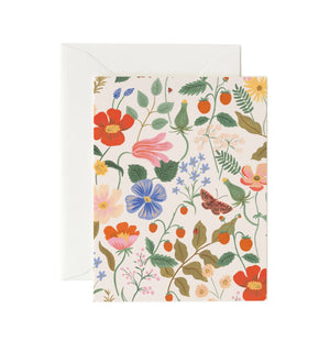 Floral patterned card with a white envelope on a white background