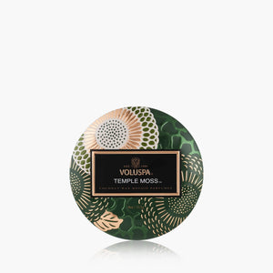 Voluspa Temple Moss 4 ounce tin candle with floral decorative designed lid. 