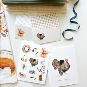 Collection of Thanksgiving-themed watercolor card illustrations on a white surface. Emily Lex Studios. 