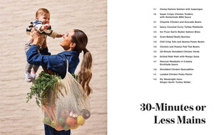 Rachel DeVaux holding baby and carrying a large mesh produce bag on her back, alongside a printed recipe list and the text '30-Minutes or Less Mains' on the right.
